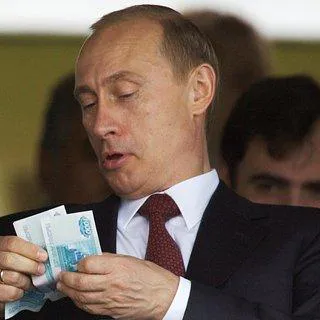 Путин ввел в обращение новые деньги